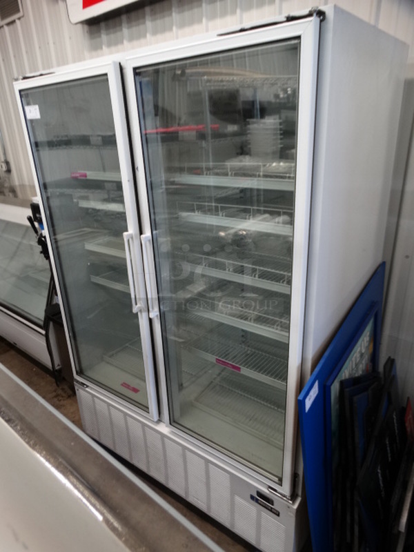 WOW! Master Bilt Model BLG-52HD Metal Commercial 2 Door Reach In Freezer Merchandiser w/ Poly Coated Racks on Commercial Casters. 115 Volts, 1 Phase. 56x33x81. Cannot Test Due To Plug Style  - Image 2 of 7