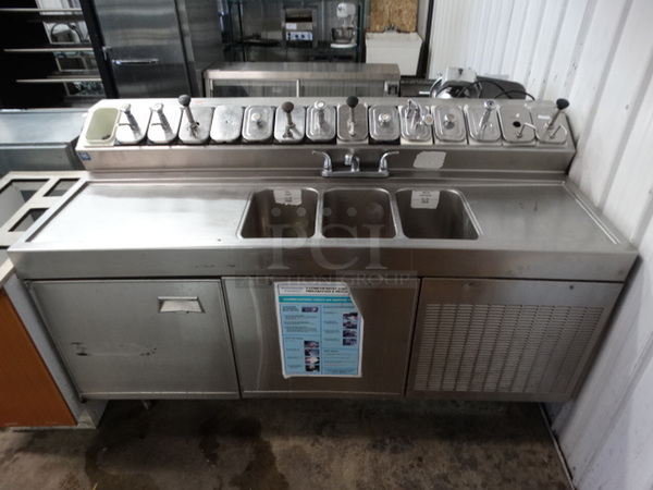 AMAZING! Stainless Steel Commercial Work Station w/ Single Door Undercounter Freezer, 15 Compartment Topping Rail Fountainette, 3 Bay Sink, Dual Drainboards, Faucet and Handles. 72x32x45. Bays 9x14x9. Drainboards 24x16x1. Cannot Test - Unit Was Previously Hardwired - Image 1 of 9