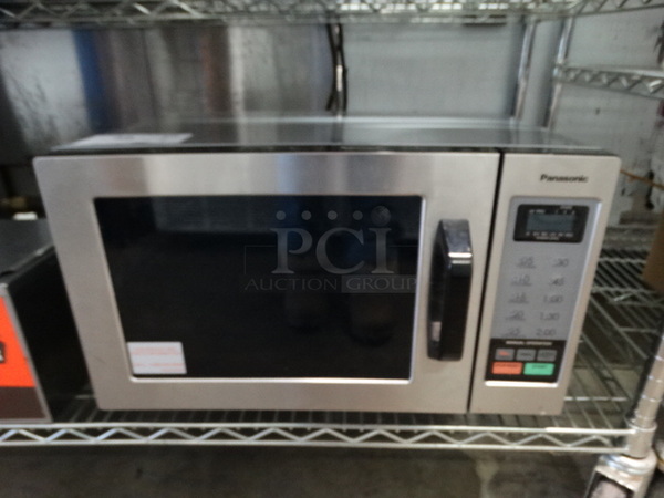 Panasonic Chrome Finish Countertop Microwave. 20x13x12 - Image 1 of 5