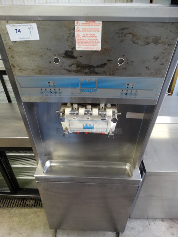 BEAUTIFUL! 2006 Taylor Model 8756-33 Stainless Steel Commercial Floor Style Air Cooled 2 Flavor w/ Twist Soft Serve Ice Cream Machine on Commercial Casters. 208-230 Volts, 3 Phase. 26x36x69