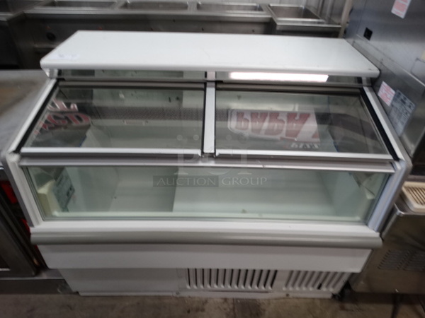 NICE! Hussmann Model LBN-4 Metal Commercial Floor Style Novelty Ice Cream Freezer Merchandiser w/ 2 Sliding Lids. 115 Volts, 1 Phase. 49x32x39. Tested and Working!