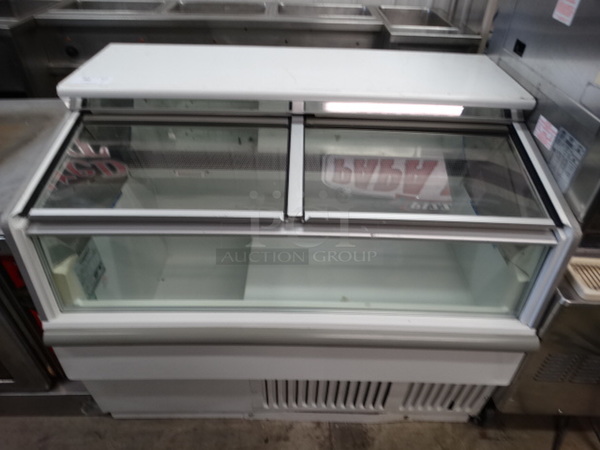 NICE! Hussmann Model LBN-4 Metal Commercial Floor Style Novelty Ice Cream Freezer Merchandiser w/ 2 Sliding Lids. 115 Volts, 1 Phase. 49x32x39. Tested and Working! - Image 1 of 7