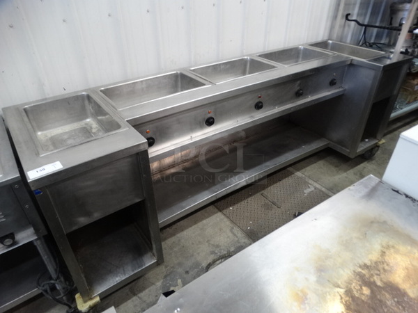NICE! Stainless Steel Commercial Electric Powered 5 Bay Steam Table w/ Undershelf on Commercial Casters. 101x29x36. Cannot Test Due To Plug Style 