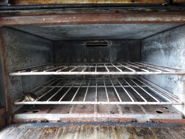 NICE! Garland Metal Commercial Gas Powered 6 Burner Range w/ Right Side Flat Top Griddle, 2 Lower Ovens and Metal Overshelf.  62x33x58 - Image 7 of 10