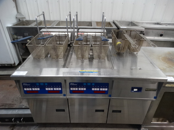 FANTASTIC! Pitco Frialator Model FE14BS-CLQVZA Stainless Steel Commercial Electric Powered 2 Bay Fryer w/ Right Side Dumping Bay and 6 Metal Fry Baskets on Commercial Casters. 480 Volts, 3 Phase. 48x34x48 - Image 1 of 11