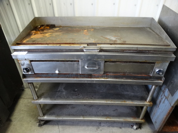 NICE! Stainless Steel Commercial Gas Powered Flat Top Griddle on Stainless Steel Stand w/ Commercial Casters. 48x24x45.5 - Image 1 of 8