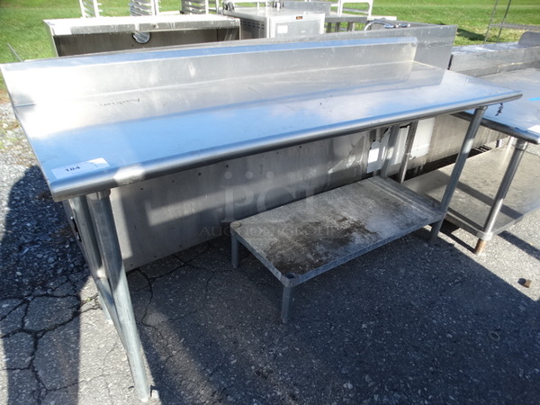 Stainless Steel Table w/ Backsplash and Metal Undershelf. 40x14x28