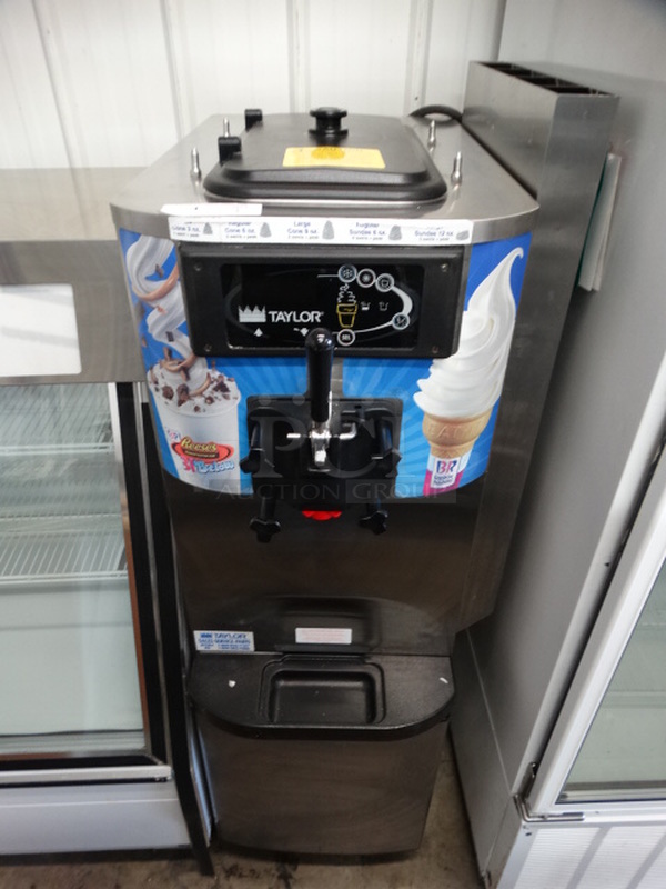 BEAUTIFUL! 2008 Taylor Model C709-33 Stainless Steel Commercial Floor Style Air Cooled Single Flavor Soft Serve Ice Cream Machine on Commercial Casters. 208-230 Volts, 3 Phase. 21x33x61.5 - Image 1 of 9