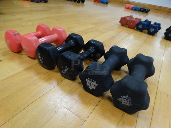 ALL ONE MONEY! Lot of 6 Dumbbells; 2 Pink 6 Pound, 2 Black 8 Pound and 2 Black 10 Pound!