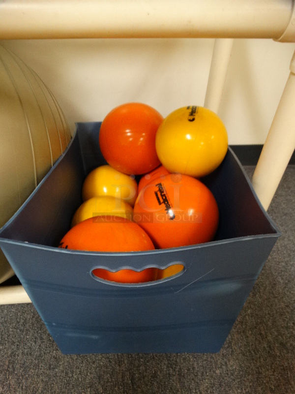 ALL ONE MONEY! Lot of Approximately 8 Small Orange and Yellow Medicine Balls in Blue Bin! 