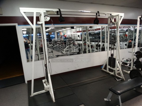 White Metal Cable Crossover Station w/ Pull Up Bar and 2 Cable Pulls. Does Not Come w/ Attachments. 144x50x94