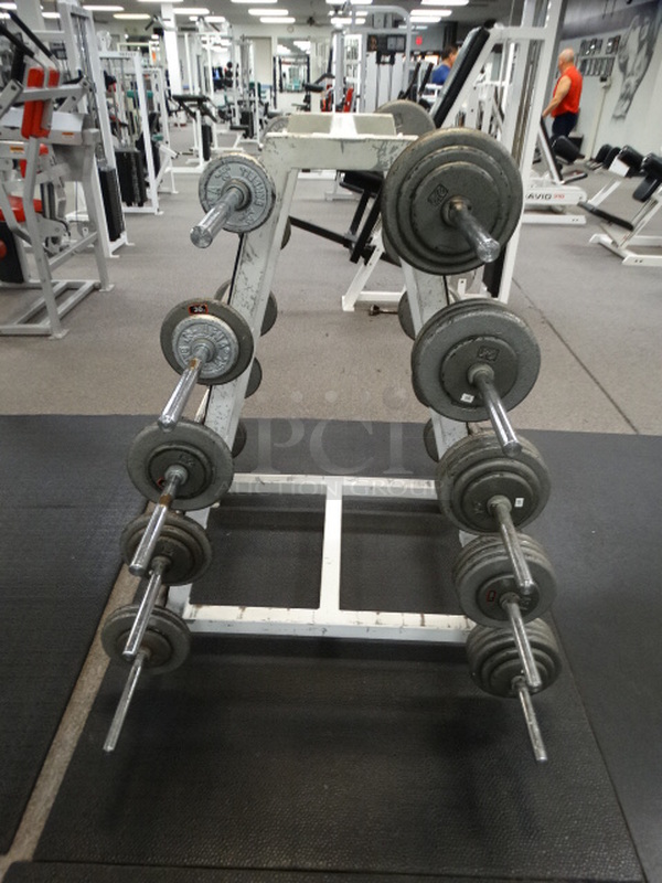 ALL ONE MONEY! Lot of White Metal Olympic Weight Bar Tree w/ 10 Bars Included In Picture! Bar Weights: 20 Pounds, 30 Pounds, 40 Pounds, 50 Pounds, 60 Pounds, 70 Pounds, 80 Pounds, 90 Pounds, 100 Pounds and 110 Pounds. 28x40x49. 60