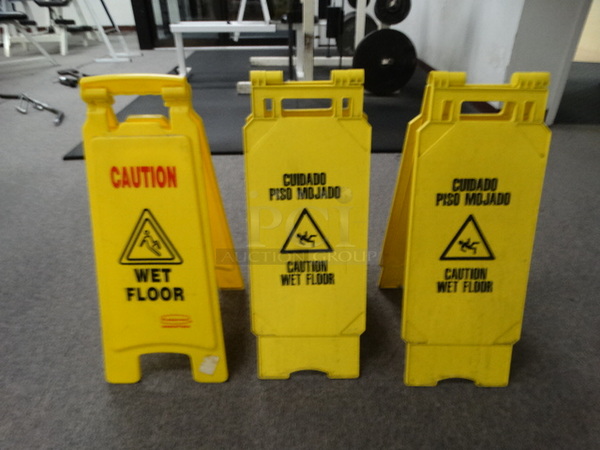 3 Yellow Poly Wet Floor Caution Signs. 3 Times Your Bid!