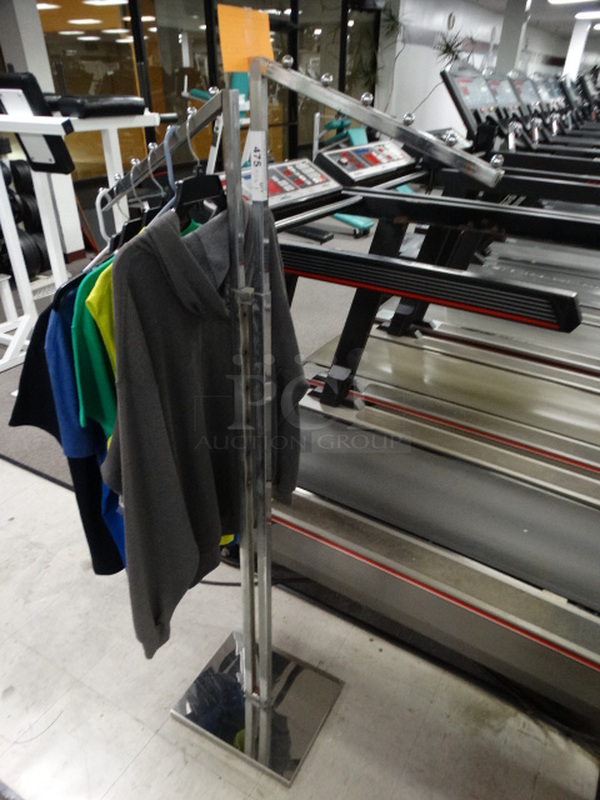 Chrome Finish Metal Clothing Rack. Does Not Include Shirts/Hangers. 12x32x61