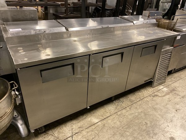 WOW! 2002 True Model TPP-93 Stainless Steel Commercial Pizza Prep Table w/ 3 Lids and 3 Doors on Commercial Casters. 115 Volts, 1 Phase. 93x32x42. Tested and Working!