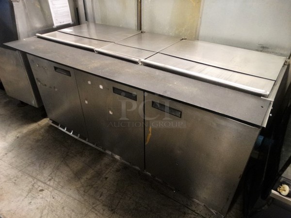 WOW! Delfield Stainless Steel Commercial Pizza Prep Table w/ 3 Lids and 3 Doors on Commercial Casters. 115 Volts, 1 Phase. 72x38x35. Tested and Working!