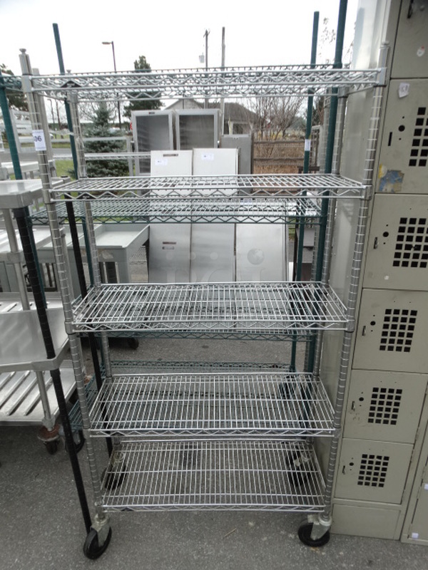 Chrome Finish 5 Tier Shelving Unit on Commercial Casters. 36x14x68. BUYER MUST DISMANTLE. PCI CANNOT DISMANTLE FOR SHIPPING. PLEASE CONSIDER FREIGHT CHARGES.