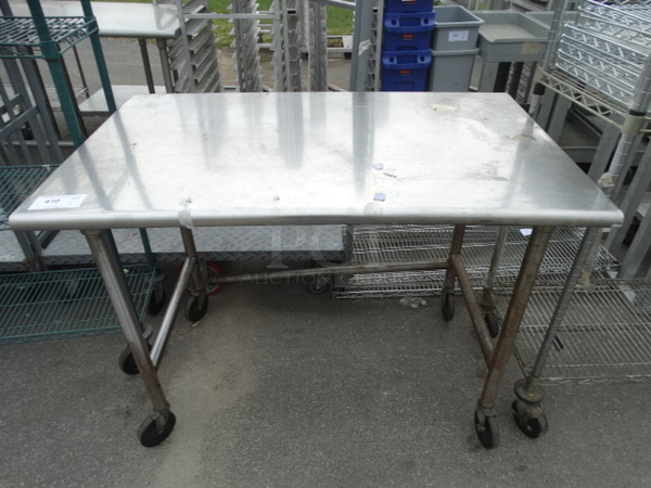 Stainless Steel Table on Commercial Casters. 48x30x36
