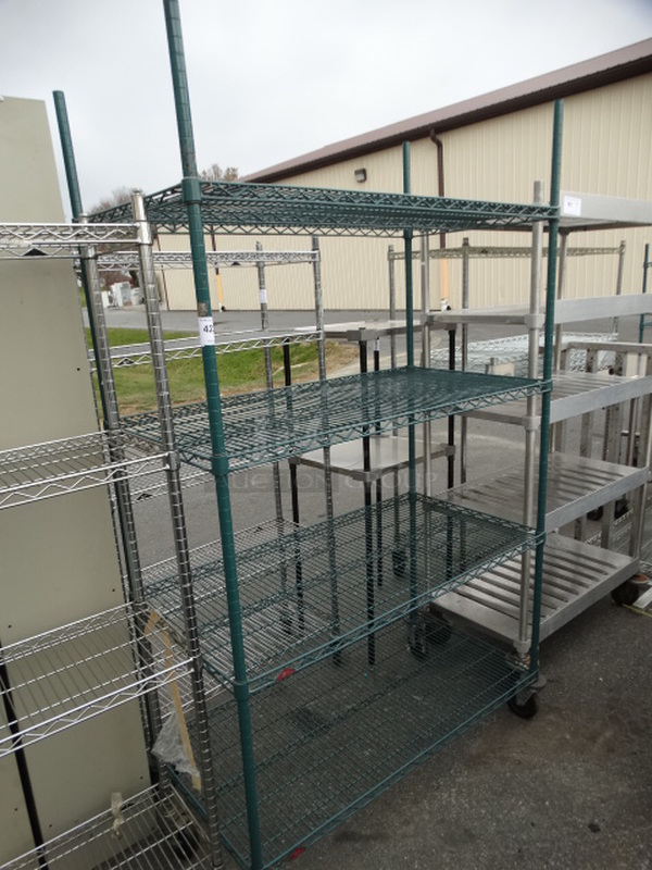 Green Finish 4 Tier Shelving Unit on Commercial Casters. 48x24x80. BUYER MUST DISMANTLE. PCI CANNOT DISMANTLE FOR SHIPPING. PLEASE CONSIDER FREIGHT CHARGES.