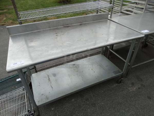 Stainless Steel Table w/ Backsplash and Undershelf on Commercial Casters. 60x30x40