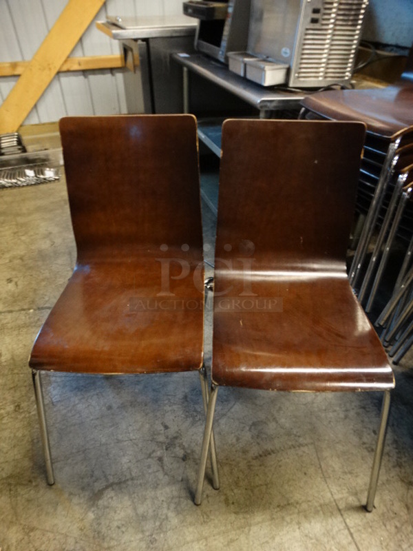 4 Dark Wood Pattern Dining Chairs w/ Metal Legs. Stock Picture - Cosmetic Condition May Vary. 18x22x33. 4 Times Your Bid!