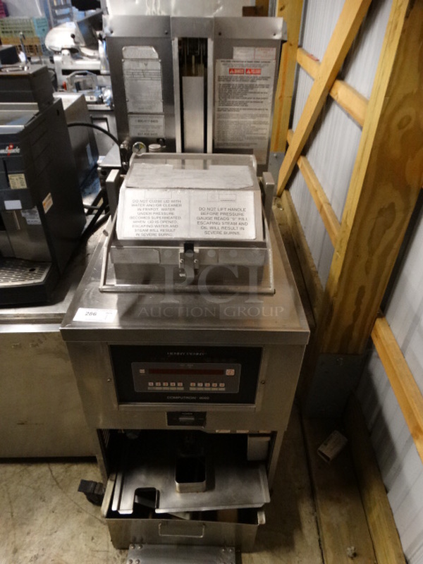 BEAUTIFUL! Henny Penny Model PFG-691 Computron 8000 Stainless Steel Commercial Natural Gas Powered Pressure Fryer w/ Filtration System on Commercial Casters. 100,000 BTU. 24x42x61