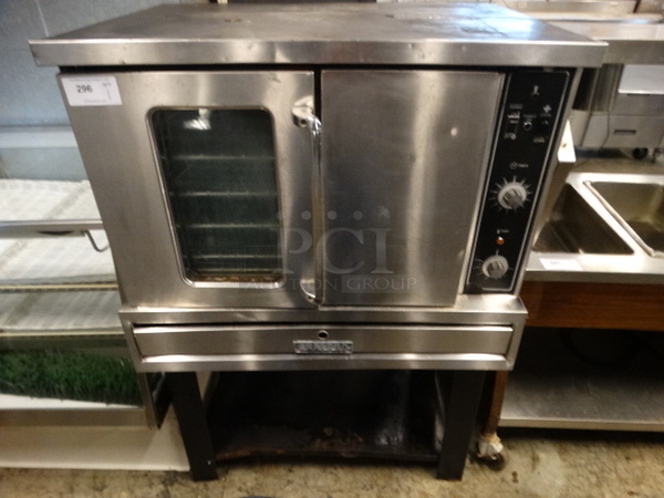 SWEET! Garland Model N10 Stainless Steel Commercial Propane Gas Powered Full Size Convection Oven w/ View Through Doors, Metal Oven Racks and Thermostatic Controls on Metal Legs. 80,000 BTU. 40x34x61