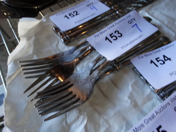 7 Metal Forks. 8