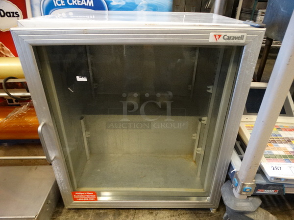 NICE! Caravell Model 125-552 Metal Commercial Countertop Mini Freezer Merchandiser. 115 Volts, 1 Phase. 24x21x27. Tested and Does Not Power On