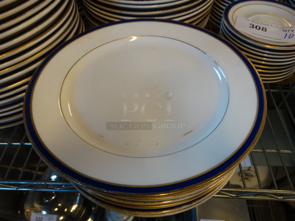 10 White Ceramic Plates w/ Blue and Gold Colored Lines on Rim. 10.5x10.5x1. 10 Times Your Bid!