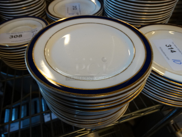 20 White Ceramic Plates w/ Blue and Gold Colored Lines on Rim. 6.25x6.25x1. 20 Times Your Bid!