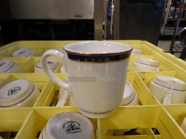 25 Various White Ceramic Mugs in Dish Caddy. Includes 4.5x3x3.5. 25 Times Your Bid!