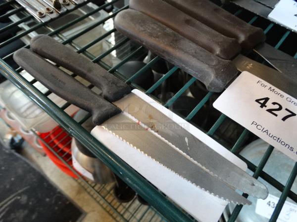 2 Metal Knives. 9