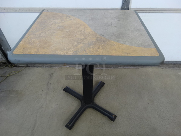 Green and Tan Table on Black Metal Table Base. Stock Picture - Cosmetic Condition May Vary. 24x20x30