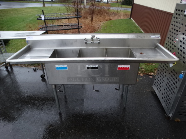 Stainless Steel Commercial 3 Bay Sink w/ Dual Drainboards and Handles. Comes w/ 4 Legs! 84x27x30. Bays 16x21x13. Drainboards 16x23x2