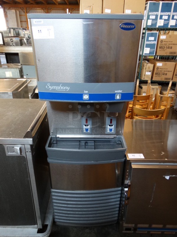 BEAUTIFUL! Follett Model 50FB400A Stainless Steel Commercial Air Cooled Ice Machine Maker and Hotel Dispenser on Commercial Casters. 115 Volts, 1 Phase. 22x24x66