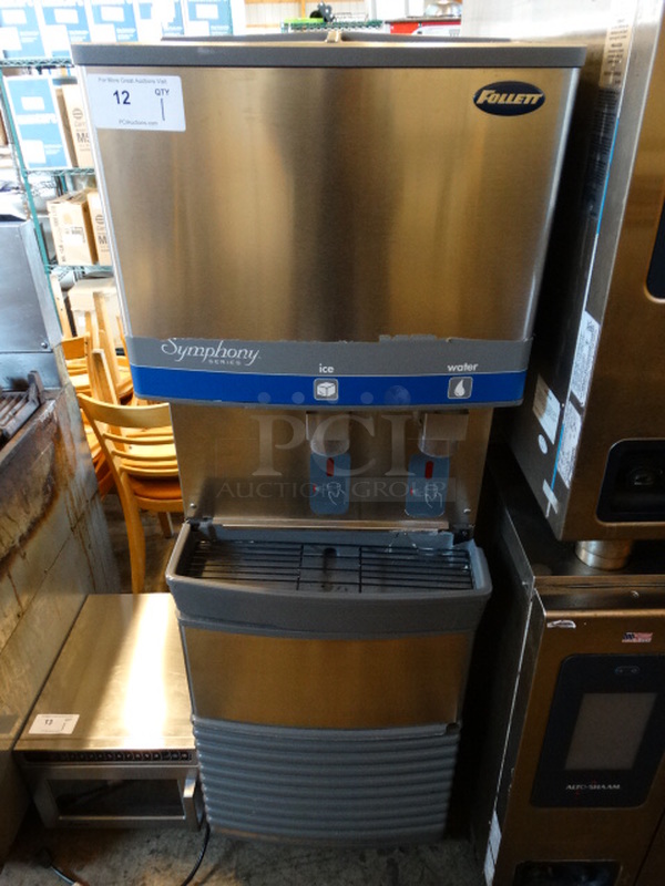 BEAUTIFUL! Follett Model 50FB400A Stainless Steel Commercial Air Cooled Ice Machine Maker and Hotel Dispenser on Commercial Casters. 115 Volts, 1 Phase. 22x24x66