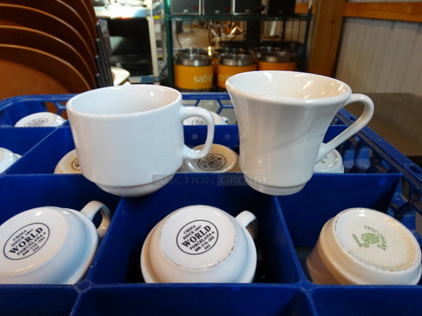 16 White Ceramic Mugs in Dish Caddy. 4x3x3, 4.5x3.5x3.5. 16 Times Your Bid!