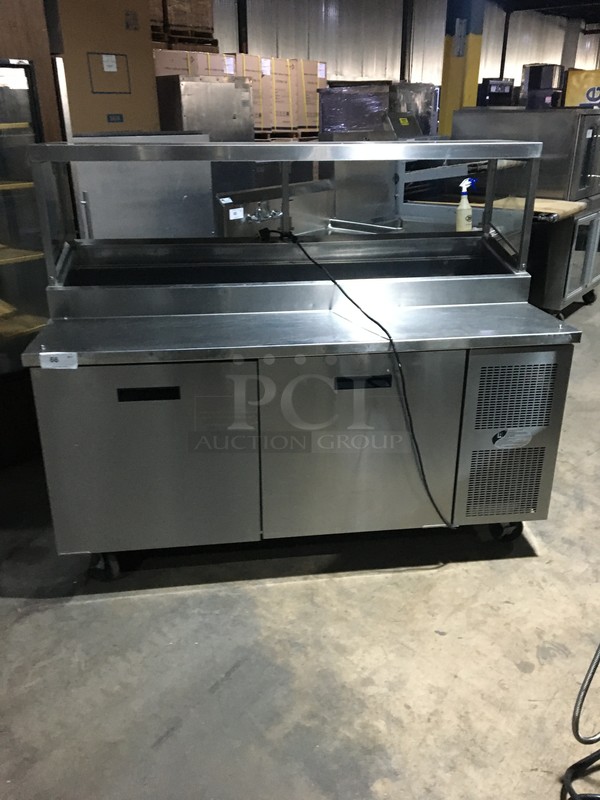 GREAT! Randell Commercial Refrigerated Pizza/Salad/Sandwich Prep Table! With 2 Door Underneath Storage Space! With Poly Coated Racks! All Stainless Steel! Model 8268N Serial W14526813! 115V 1Phase! On Commercial Casters!