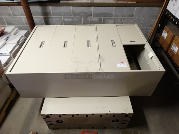 2 Metal Filing Cabinets. 42x18x65. 2 Times Your Bid!