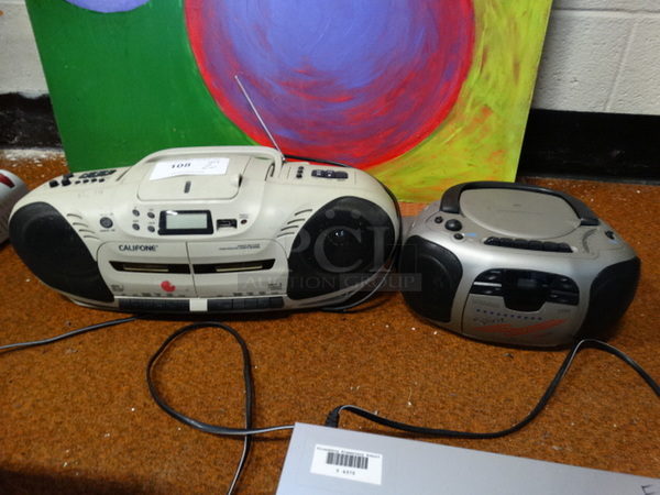 2 Tape/CD Players. 13x9x6, 21x8x8. 2 Times Your Bid!