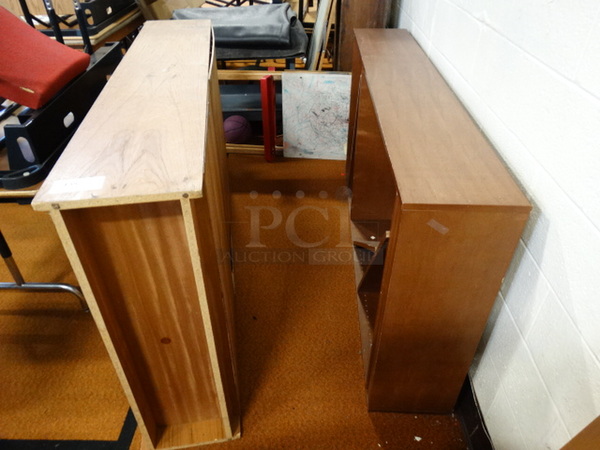 2 Wood Pattern Shelving Units. 39.5x13x69, 36x12x72. 2 Times Your Bid!