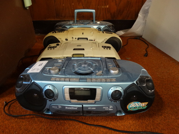 4 Cassette CD Players. Includes 20x9x7. 4 Times Your Bid! - Image 1 of 6