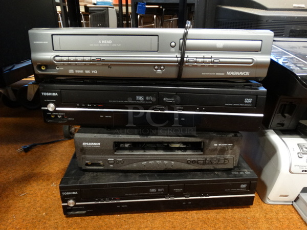 4 Items; 3 VHS DVD Players and 1 VHS Player. Includes 17x9x3.5. 4 Times Your Bid!