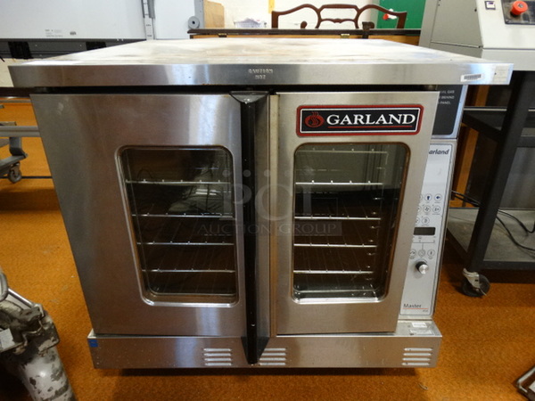 BEAUTIFUL! Garland Master 450 Stainless Steel Commercial Gas Powered Full Size Convection Oven w/ View Through Doors and Metal Oven Racks. 38x42x36