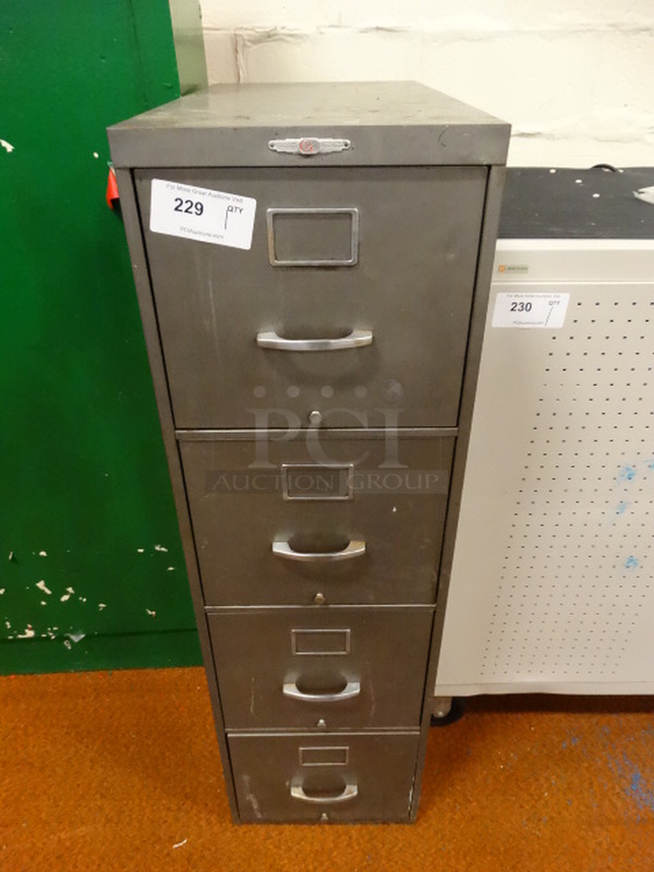 Yawman and Rochester Gray Metal 4 Drawer Filing Cabinet. 15x28x51