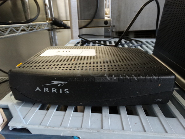 Arris Model TM722G/CT Router. 9x7x2