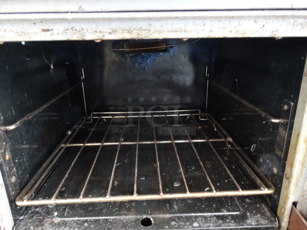 NICE! Garland SunFire Stainless Steel Commercial Gas Powered 4 Burner Range w/ Lower Oven and Stainless Steel Overshelf on Commercial Casters. 24x33x57 - Image 8 of 9