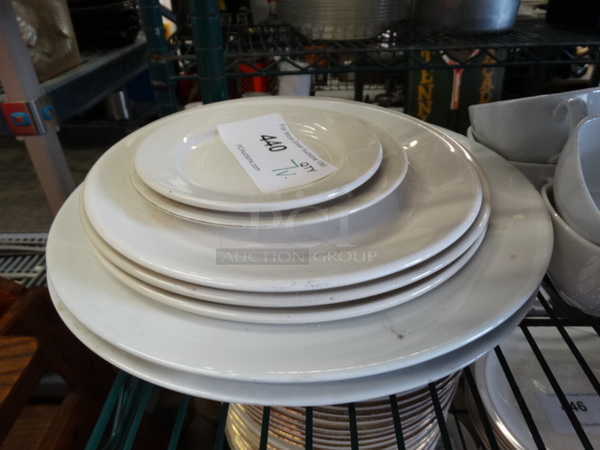 7 Various White Ceramic Plates. Includes 12.5x12.5x2. 7 Times Your Bid!