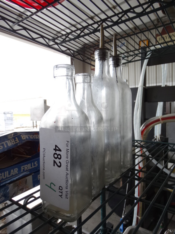 4 Glass Bottles. 2.5x2.5x8, 2.5x2.5x12. 4 Times Your Bid! - Image 1 of 3